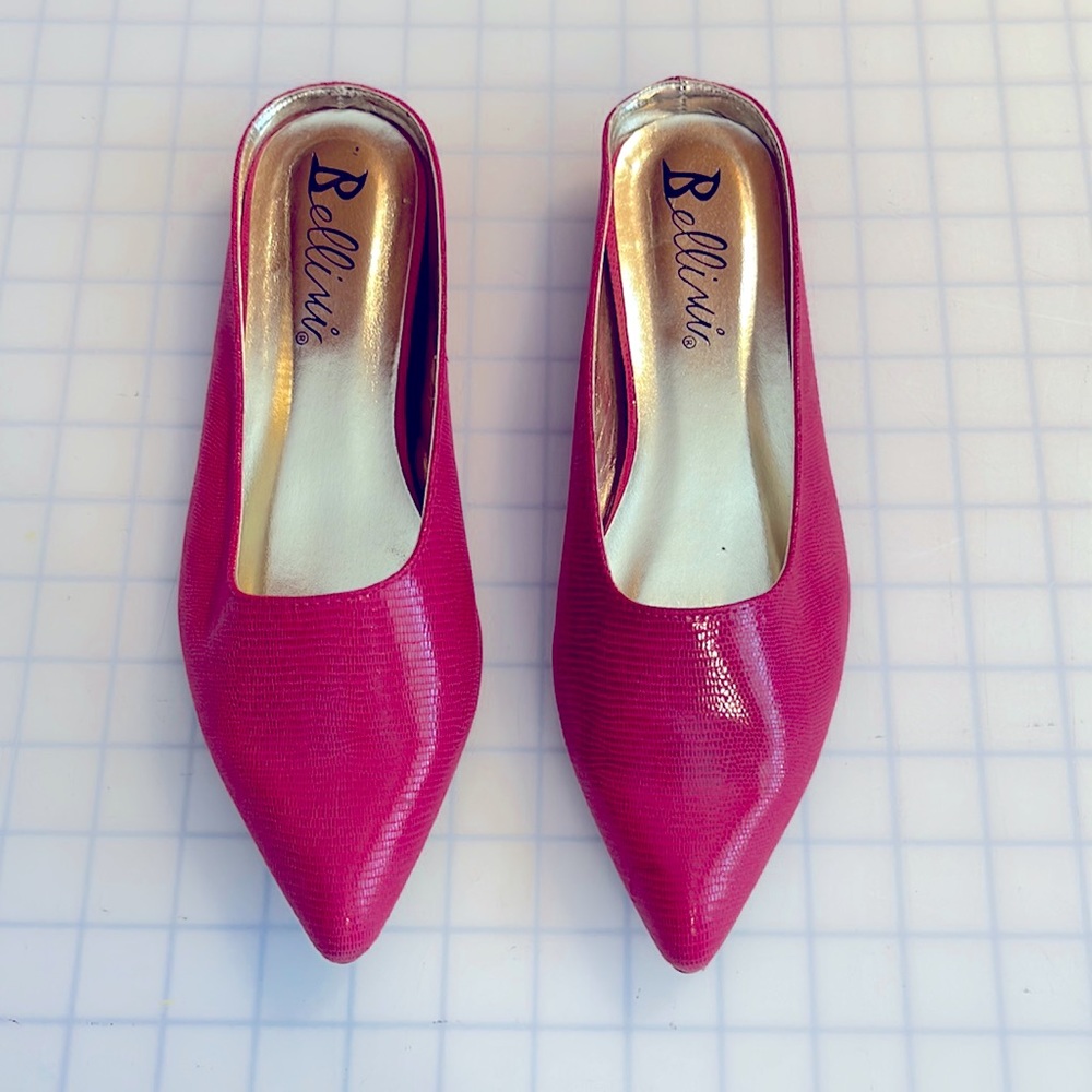 Bright pink faux snake skin mules